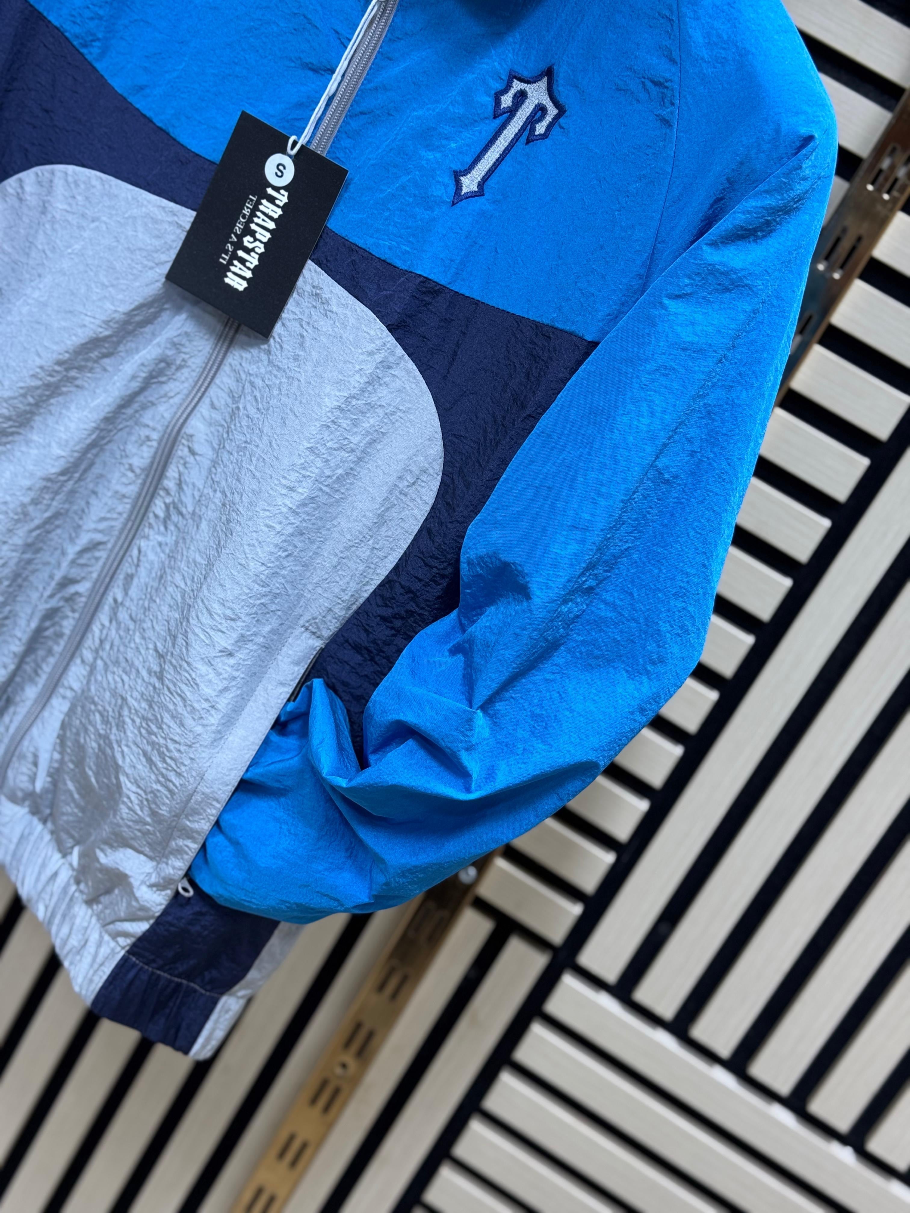 Chandal Trapstar azul y gris